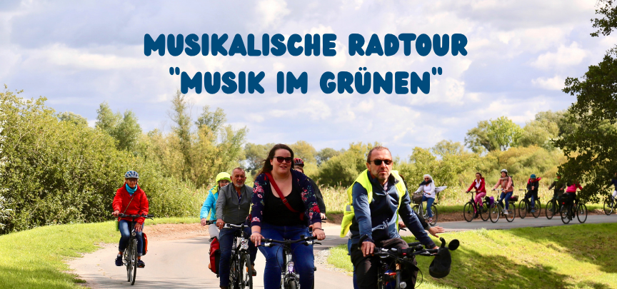 Musikalische radtour Radfahrende auf dem Deich