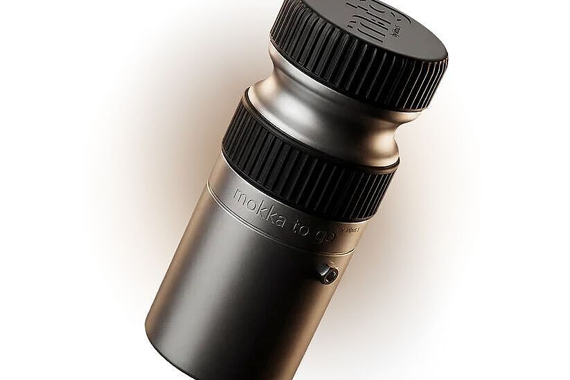 Ein Kaffeekocher für den Flaschenhalter vor hellem Hintergrund, 